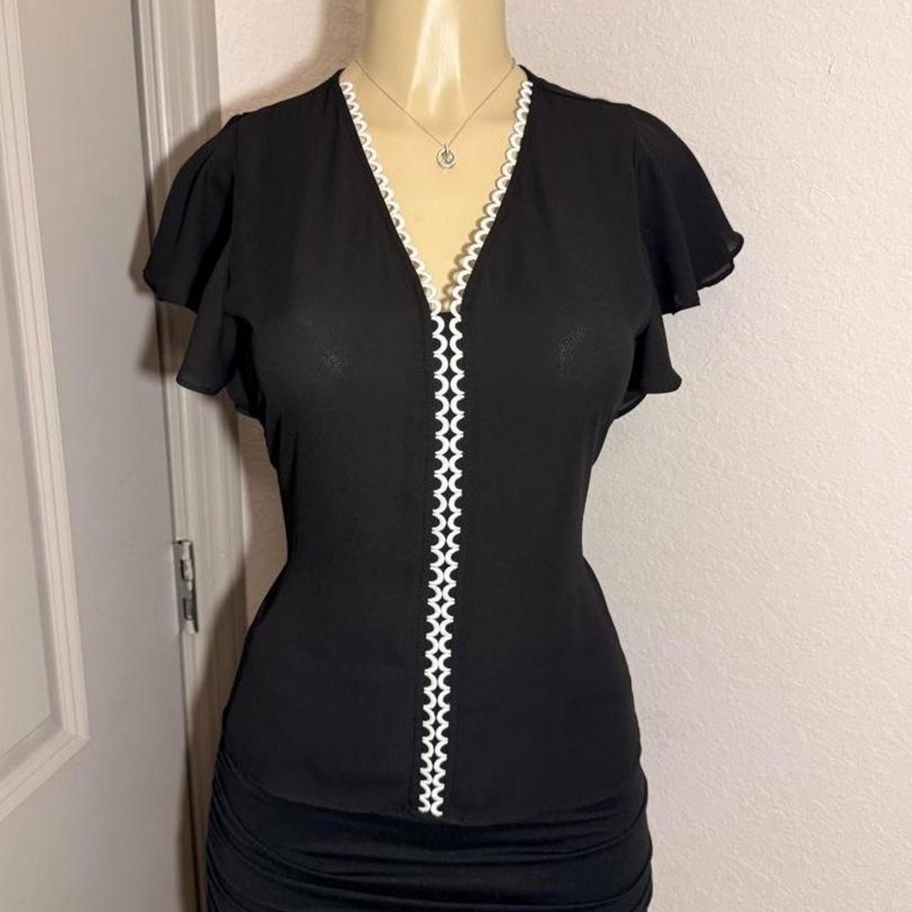 WHBM Black & white ruffle sleeve blouse